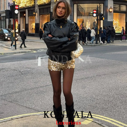 Oversized Black Leather Jacket with Button Front